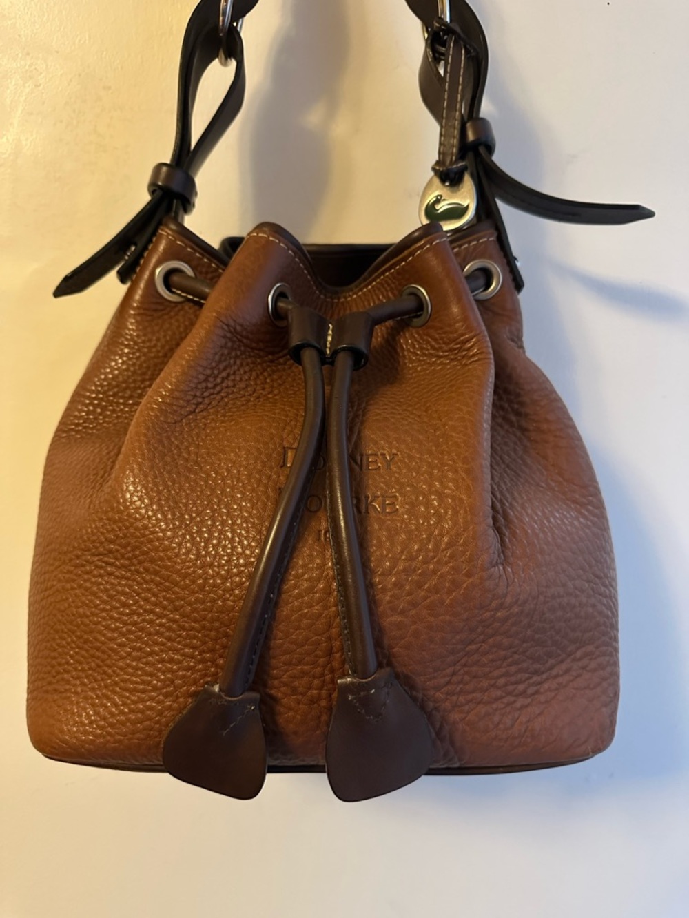 Dooney & Bourke Brown Leather Drawstring Shoulder Bag with Dark Brown Trim